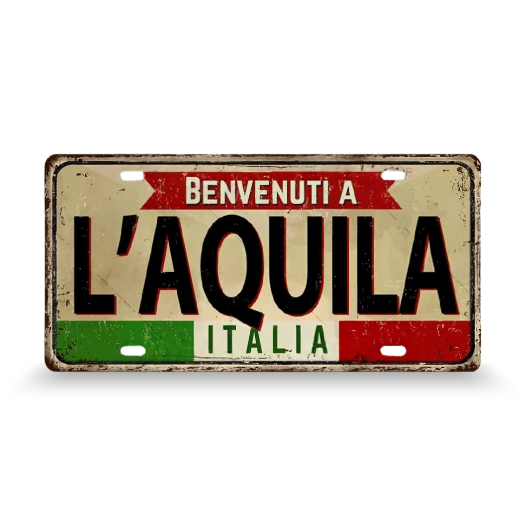 Decorative license plate with 'Benvenuti a L'Aquila Italia' text on a white background • Papagaio Studio Art Shop