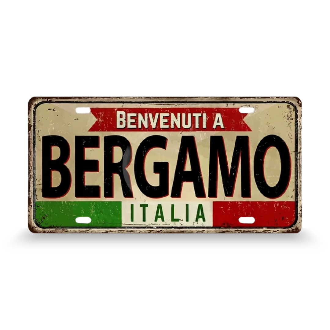 Decorative sign with 'Benvenuti a Bergamo Italia' text on a white background • Papagaio Studio Art Shop