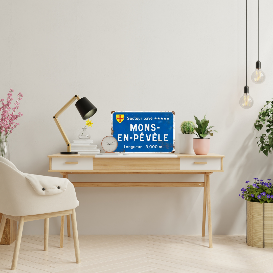 Home office with a desk, chair, and decorative elements including a sign for 'Mons-En-Pevèle'.