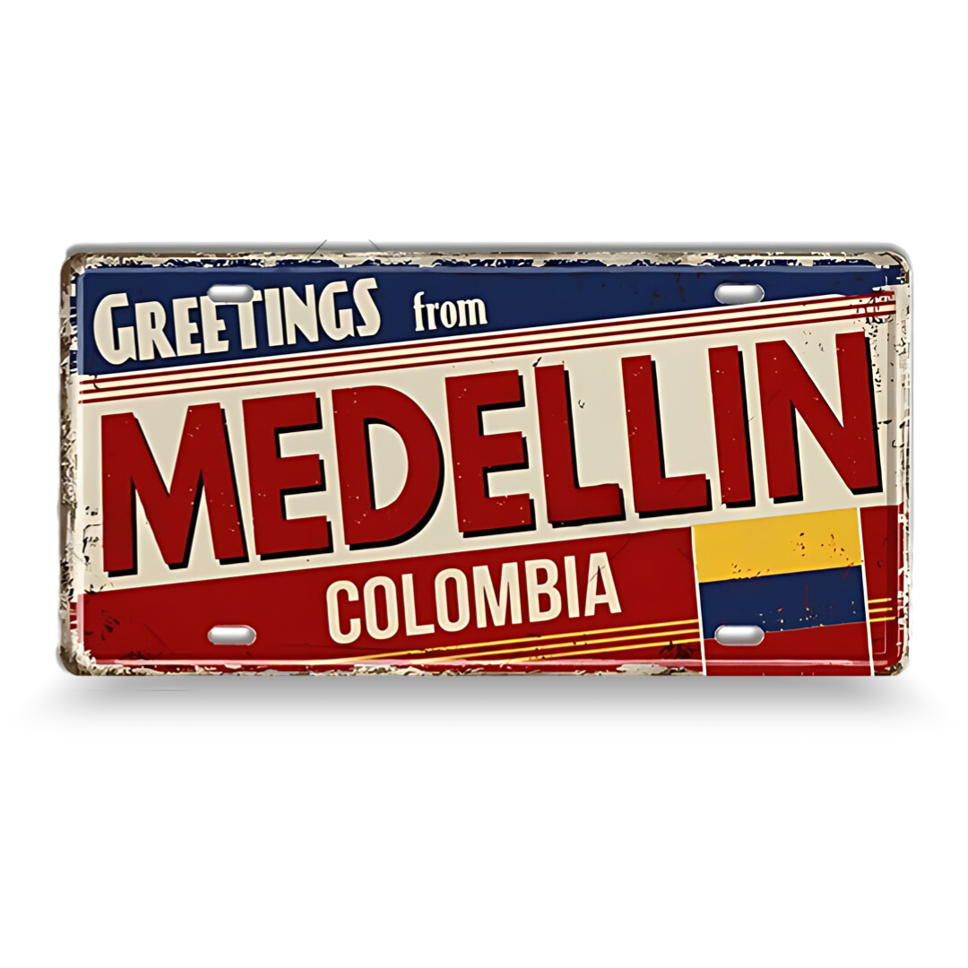 Vintage-style sign with 'Greetings from Medellin, Colombia' text on a white background