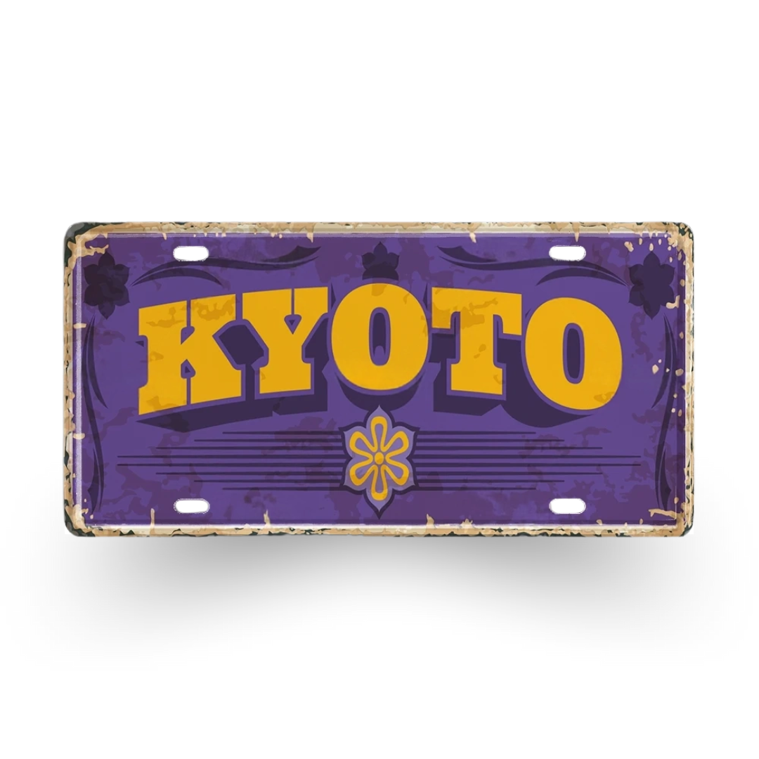 Vintage-style license plate with 'KYOTO' in yellow on a purple background