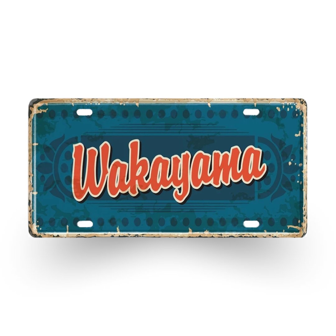 Vintage-style license plate with 'Wakayama' text on a blue background