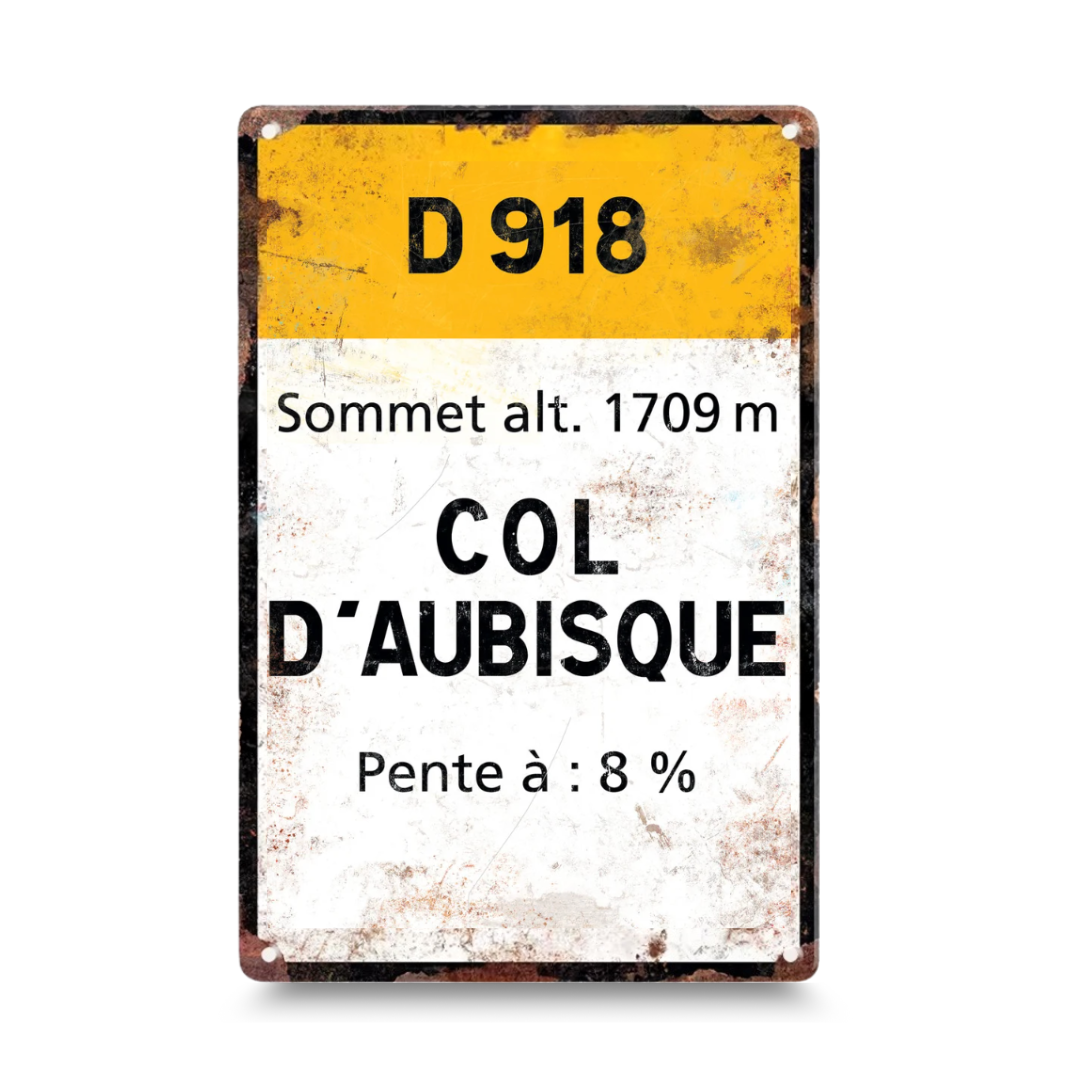 Vintage-style metal sign with road information for Col d'Aubisque on a white background