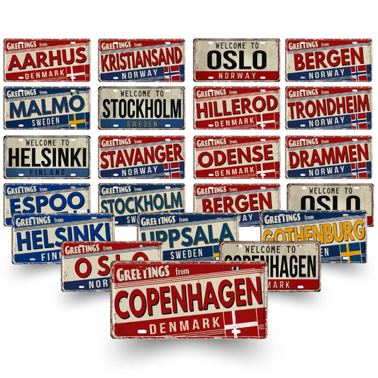 Collection of metal signs with city names and national flags from various Scandinavian cities.