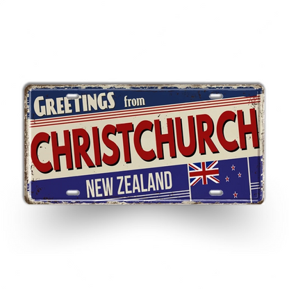 Vintage-style sign with 'Greetings from Christchurch, New Zealand' text and flag design.
