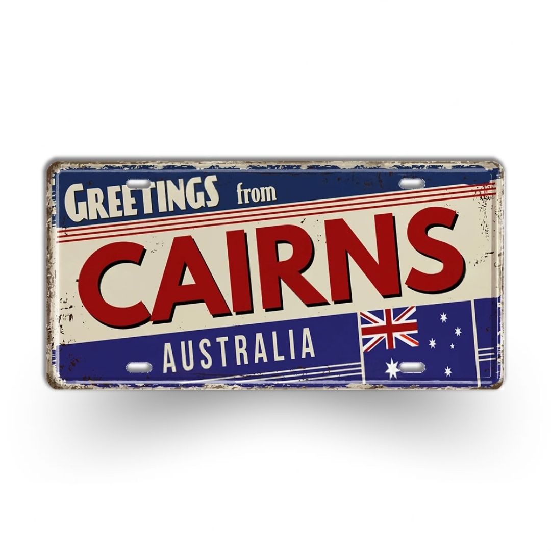 Vintage-style sign with 'Greetings from Cairns, Australia' text and Australian flag.