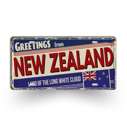 Vintage-style sign with 'Greetings from New Zealand' text and flag design on a white background