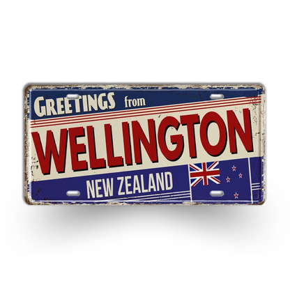 Vintage-style sign with 'Greetings from Wellington, New Zealand' text and a flag design.
