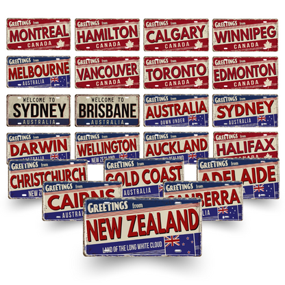 Collection of decorative license plates with city names and flags from Australia, New Zealand and Canada.