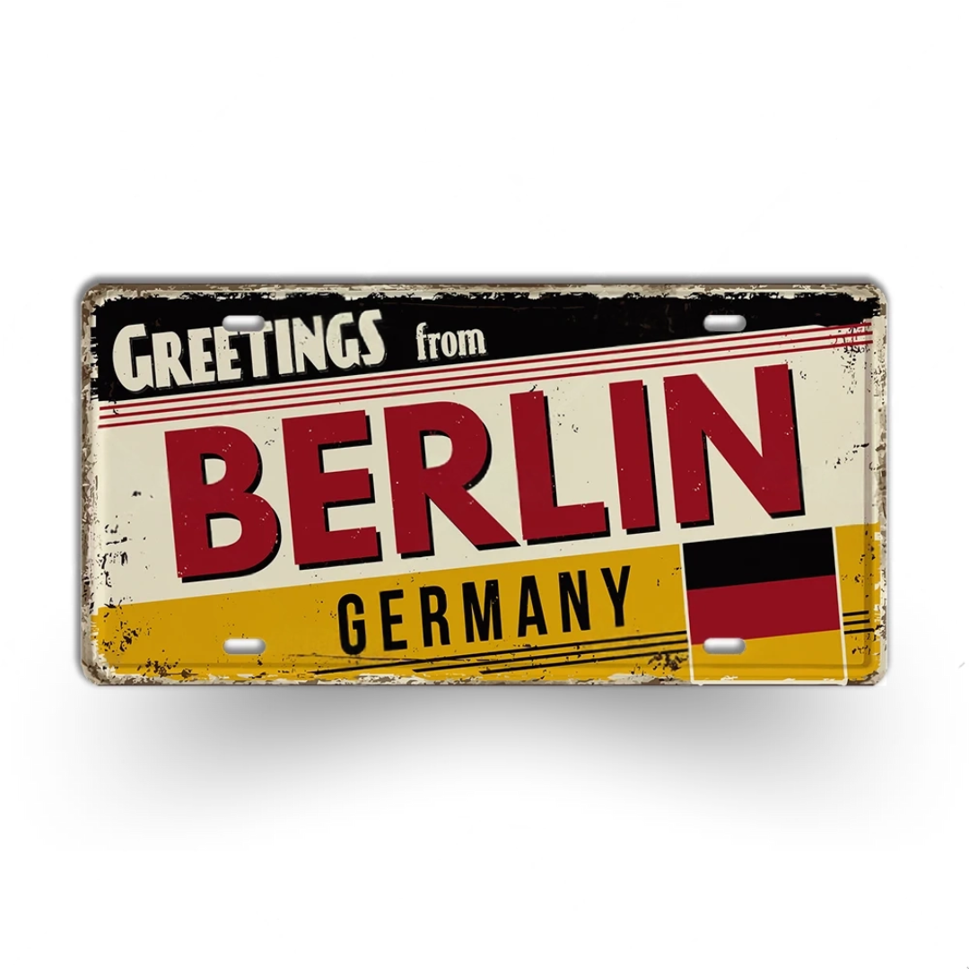 Vintage-style sign with 'Greetings from Berlin, Germany' text and German flag on a white background