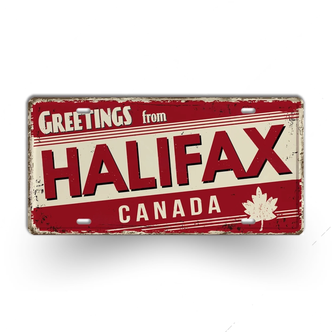 Vintage-style sign with 'Greetings from Halifax, Canada' text on a red and beige background.