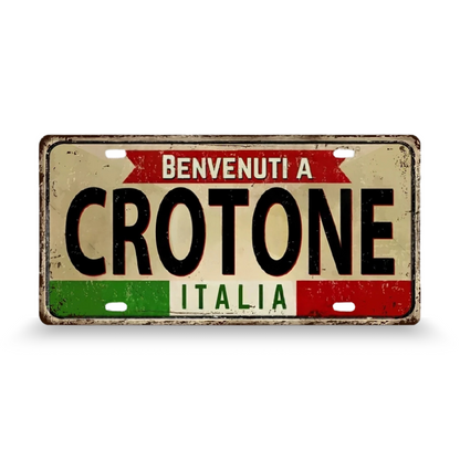 Decorative sign with 'Benvenuti a Crotone Italia' text on a white background • Papagaio Studio Art Shop