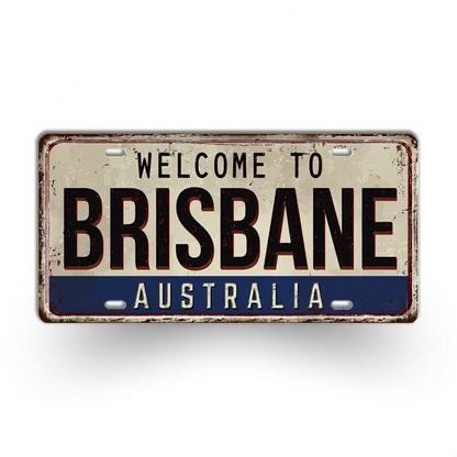 Vintage-style sign with 'Welcome to Brisbane Australia' text on a white background