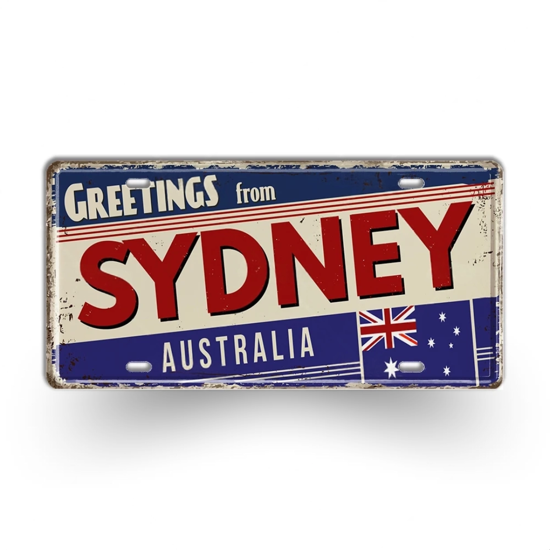 Vintage-style sign with 'Greetings from Sydney Australia' text and Australian flag.