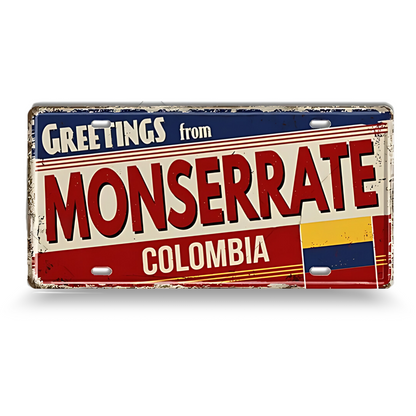 Vintage-style sign with 'Greetings from Monserrate, Colombia' text and Colombian flag design.