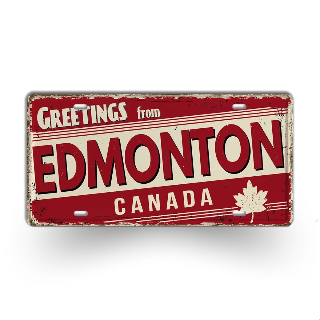 Vintage-style sign with 'Greetings from Edmonton, Canada' text on a red background.