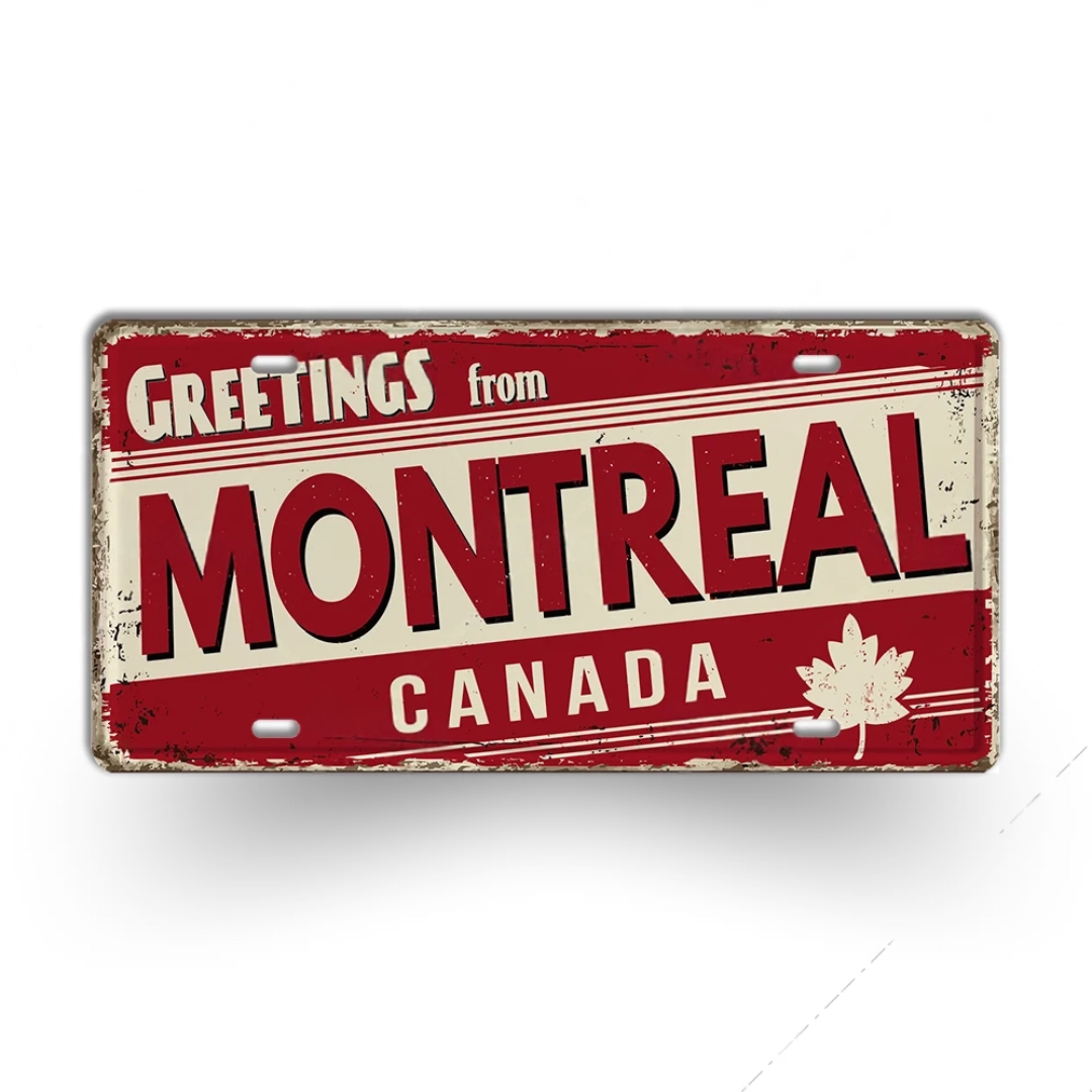 Vintage-style sign with 'Greetings from Montreal, Canada' text and a maple leaf on a white background.