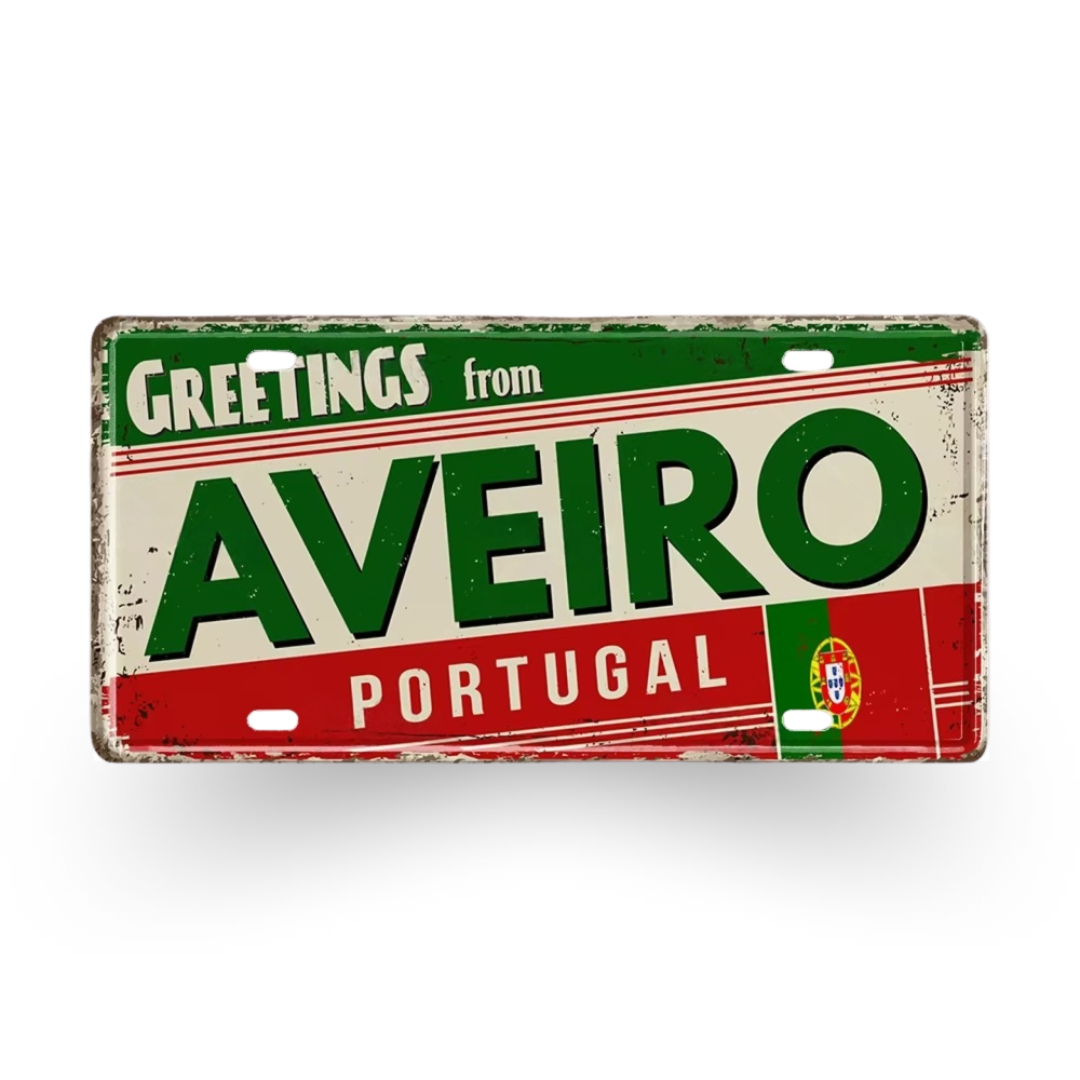 Vintage-style sign with 'Greetings from Aveiro Portugal' text on a white background
