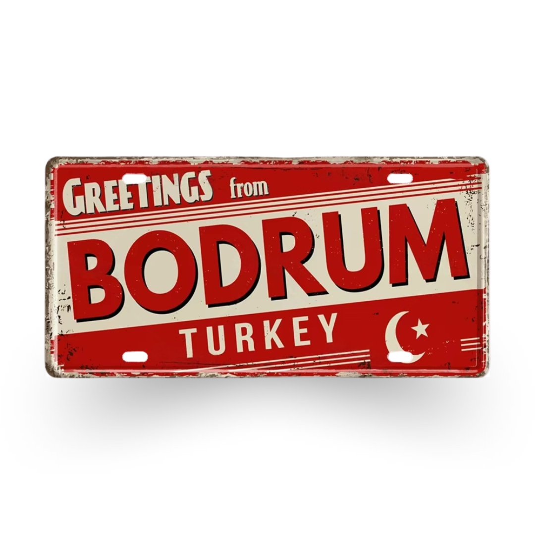 Vintage-style sign with 'Greetings from Bodrum Turkey' text on a red background