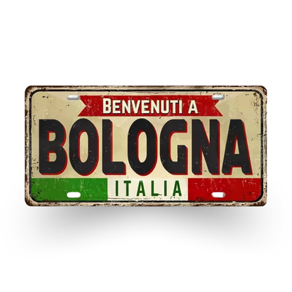 Decorative sign with 'Benvenuti a Bologna Italia' text on a white background