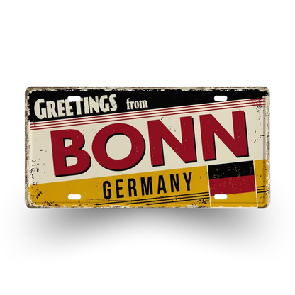Vintage-style sign with 'Greetings from Bonn, Germany' text and German flag design.