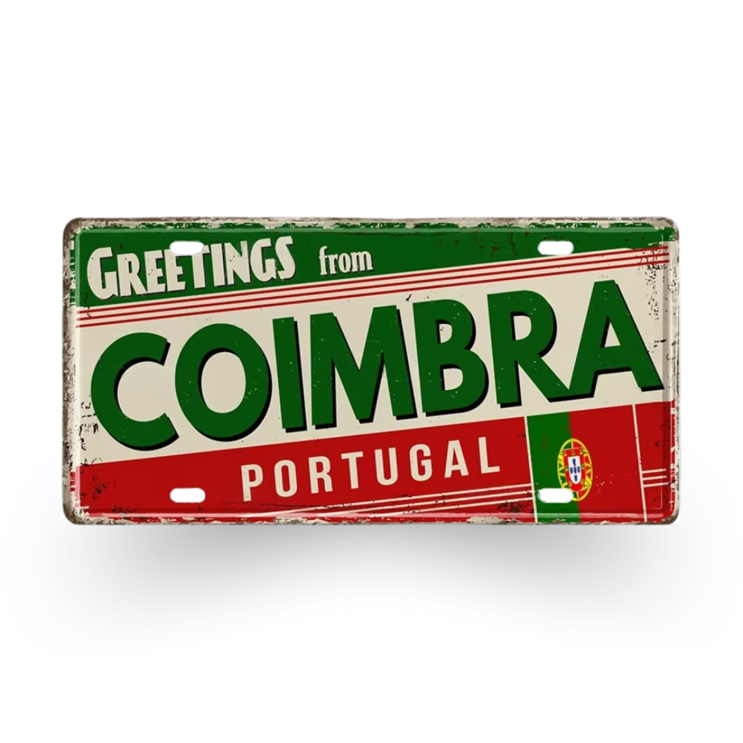 Vintage-style sign with 'Greetings from Coimbra, Portugal' text on a white background