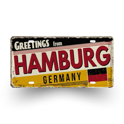Vintage-style sign with 'Greetings from Hamburg, Germany' text and German flag design.