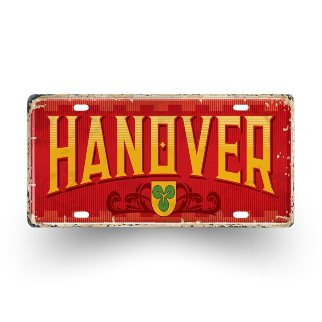 Red license plate with 'HANOVER' in yellow text on a white background