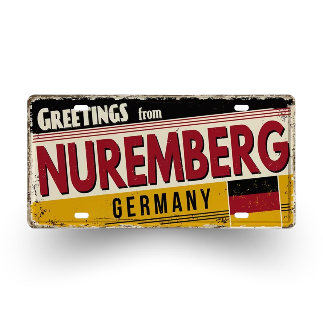 Vintage-style sign with 'Greetings from Nuremberg, Germany' text and German flag design.