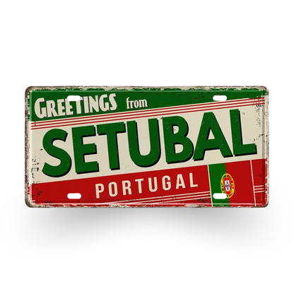 Vintage-style sign with 'Greetings from Setubal, Portugal' text on a white background