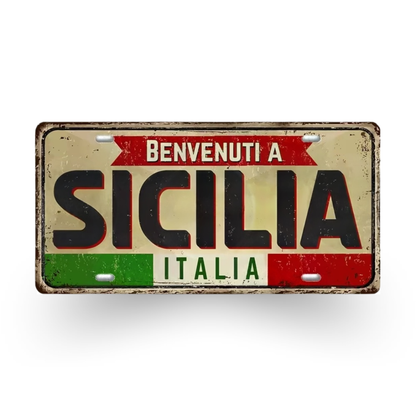 Decorative sign with 'Benvenuti a Sicilia Italia' text on a white background