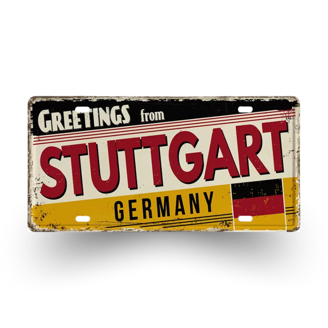 Vintage-style sign with 'Greetings from Stuttgart, Germany' text and German flag design.