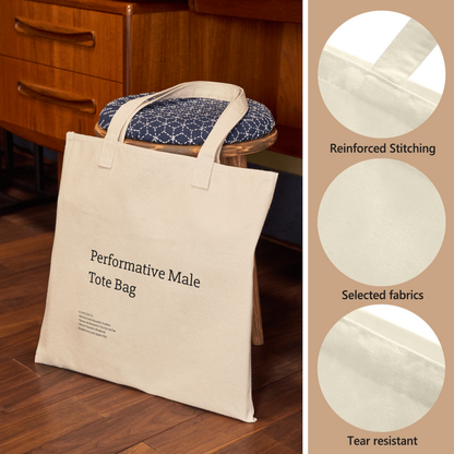 A stylish canvas tote bag featuring a self-aware aesthetic, designed for the modern male shopper. The bag showcases a unique performative design, blending functionality with contemporary art influences, perfect for carrying everyday essentials.